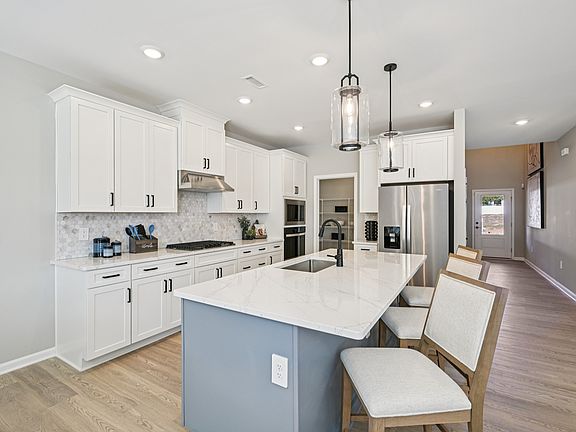 Kitchen in the Johnson floorplan at a Meritage Homes community in Raleigh, NC.