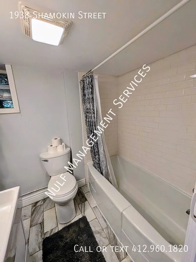 2 bed, 2 bath + finished basement and 2 car parking pad in South Side Slopes — Photo 4