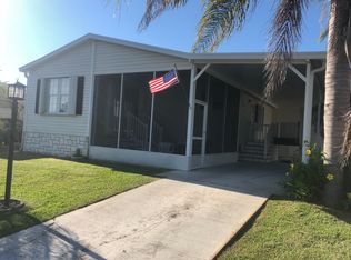 1002 Oriole Cir, Barefoot Bay, FL 32976