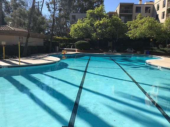 Main pool and hot tub in the back