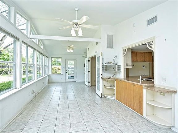 Massive addition on back of home providing more living, kitchen to the right, reason TCAD sqft shows smaller than actual