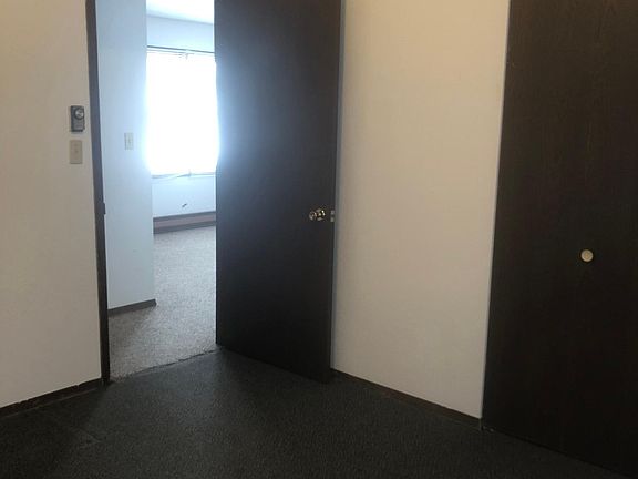 Bedroom looking into living room