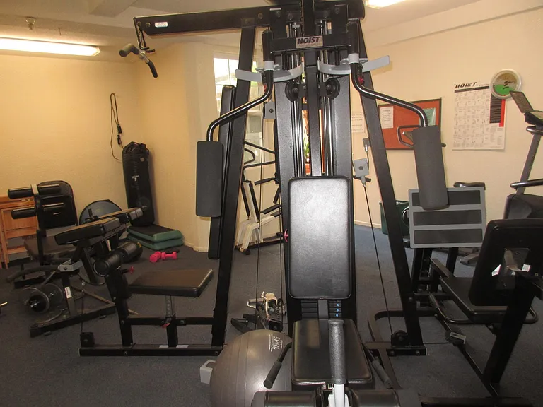 ocean view from some fitness equipment in this gym room also used for H.O.A. monthly meetings.