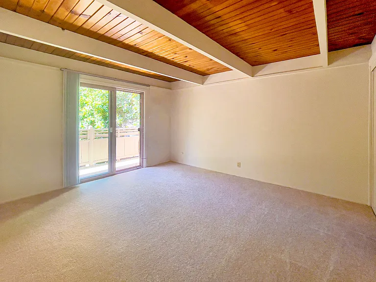Townhouse: large 1 bedroom with uncovered deck. Large bedroom-length closets.