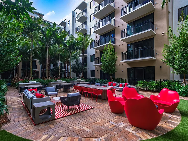 Outdoor entertainment space outfitted with grilling stations.