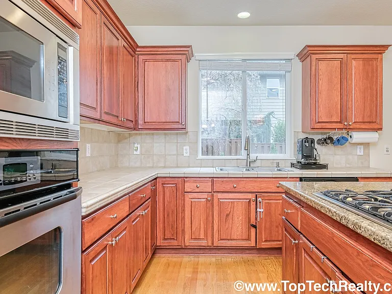 12852 NW Bayonne Ln — Photo 6