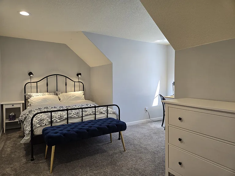 Second-floor bedroom 2 with queen bed