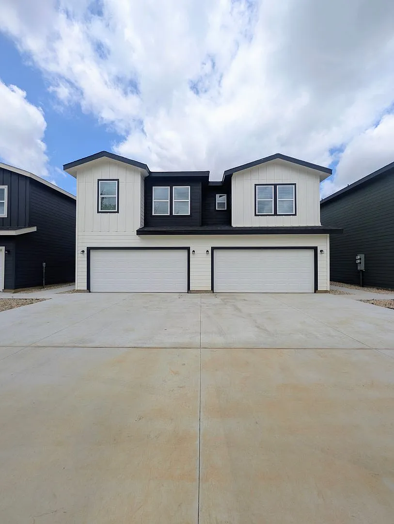 Brand New Duplex in New East Parks Community — Photo 1