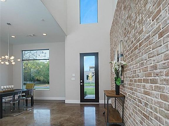 Welcome Home!  Brick Wall accent brings the outdoors in for a seemless look!