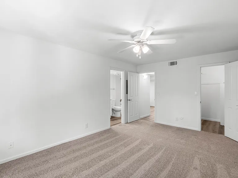 Spacious Bedroom with Large Walk-in Closet and on Suite Bathroom.
