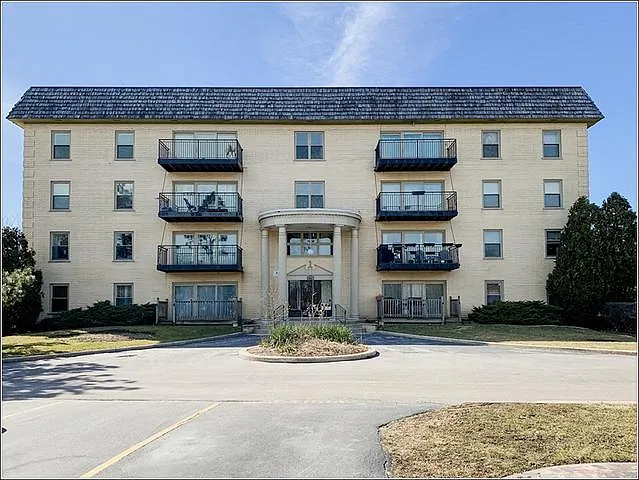 9601 Golf Rd #401 — Photo 1