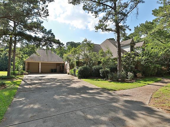 Most of the shrubbery has grown up around the home but once cleared you'll be able to see the beautiful 1.5 story home with full front porch.