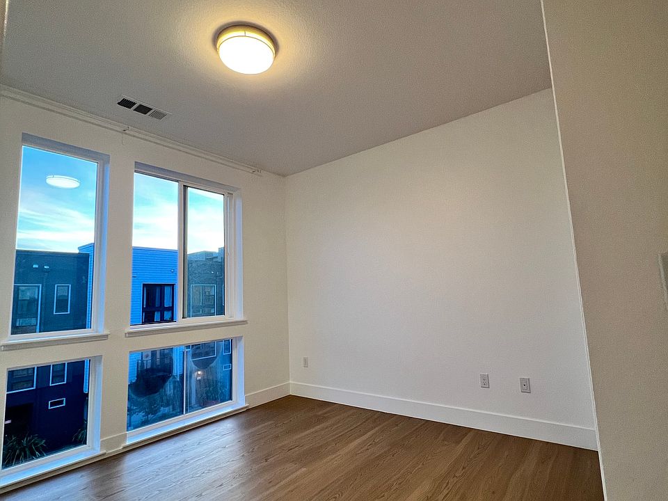 4th bedroom with an en suite bathroom on the third floor