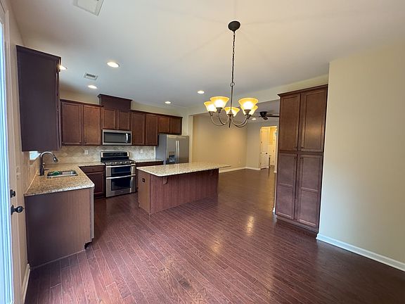 Kitchen and dining from patio entrance