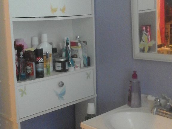Shelf on bathroom wall