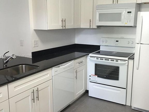2nd image of 860 NE 209th Ter APT 104-33