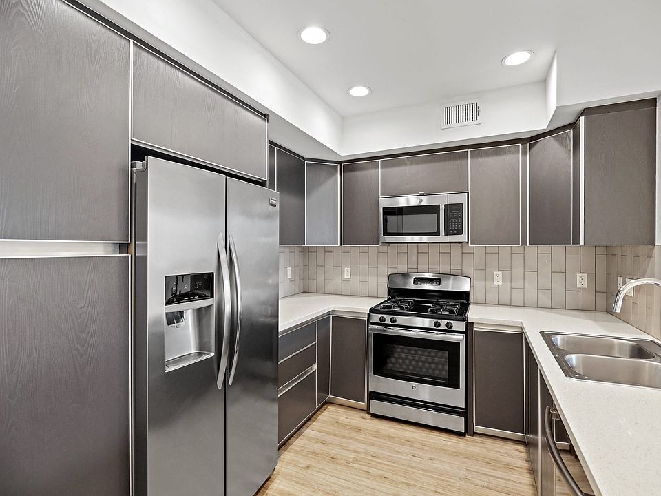 Kitchen with Energy-Efficient Appliances and Ample Cabinet Storage