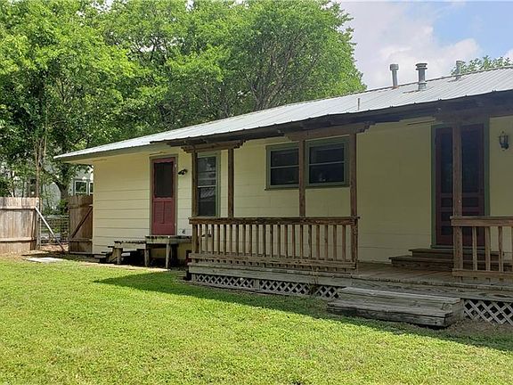 SPACIOUS BACKYARD WITH COVERED DECK OFF MASTER BR. OWNER INSTALLING 16'X16' DECK OFF THE OTHER BACK DOOR FROM KITCHEN. PLAYSCAPE HAS BEEN REMOVED