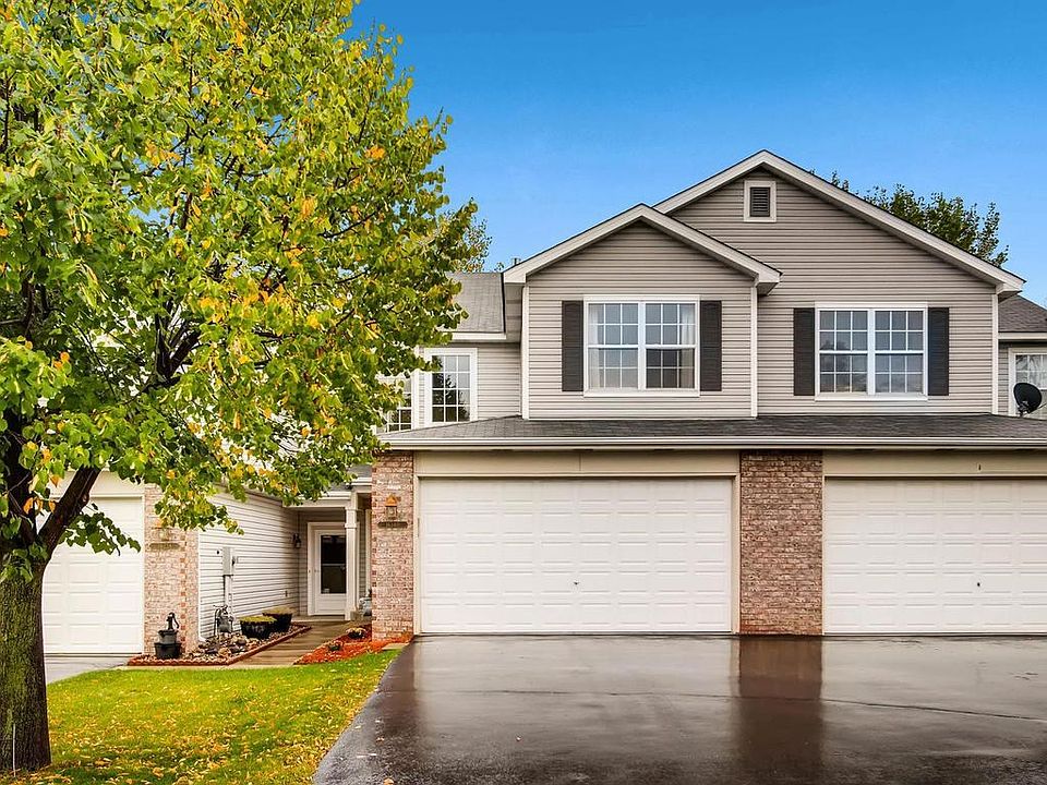 Beautiful town home with private backyard views. New carpet, hard wood flooring, professionally painted, and new light fixtures from top to bottom!