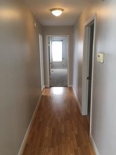 Bedroom hallway with laminate flooring