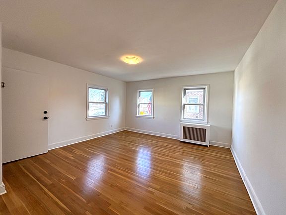 Living room with refinished floors.