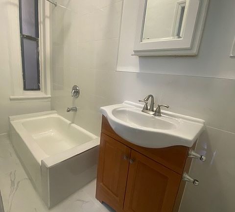 5th image of 327 E 3rd St APT 3D