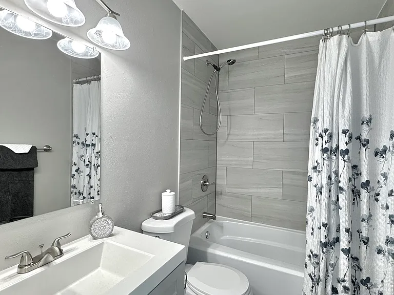 Clean and functional full bathrooms provide a comfortable space for daily routines.