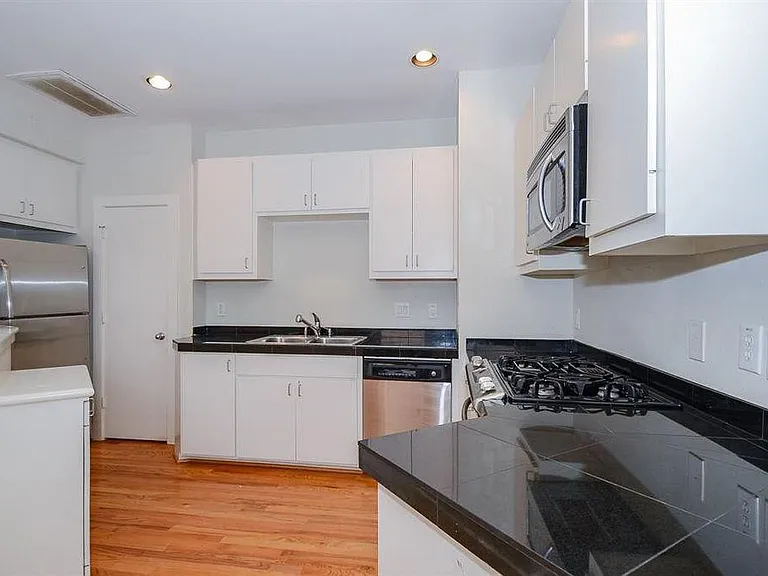 Home comes with all appliances as shown and ample cabinet space