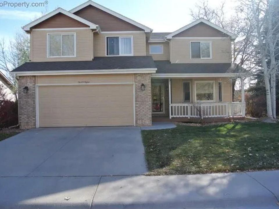 Front view of home. Two car garage. Front porch facing north.