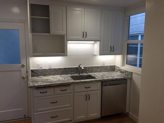 Kitchen with garbage disposal and dishwasher