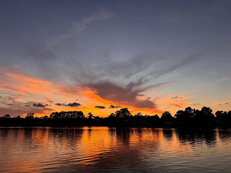 Sunset over Bayou Grande. Walk few blocks to the end of Lownde Ave to see the sunsets and the Blue Angel's shows.