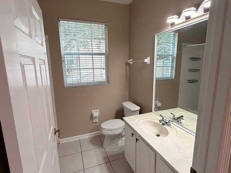 Guest bathroom with ample lighting