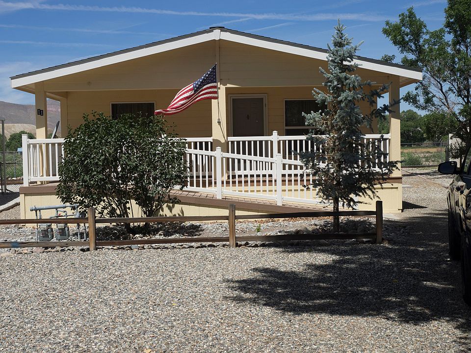Covered porch faces East