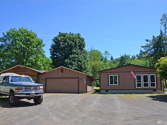 Plenty of parking for guests. Oversized garage with shop area and nice carport for boat.