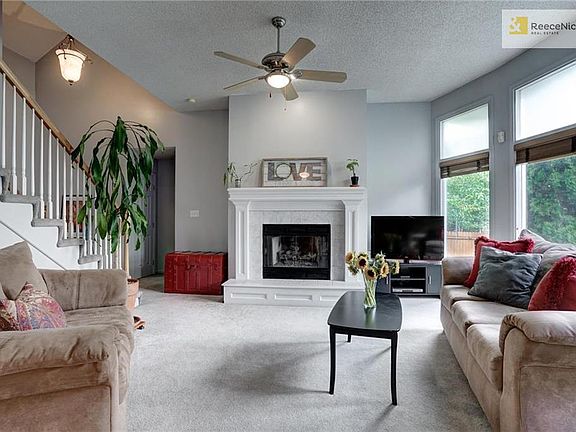 Family room has been freshly painted and is flooded with natural light.