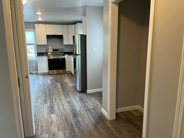 Pantry closet off of kitchen. Doors not shown.