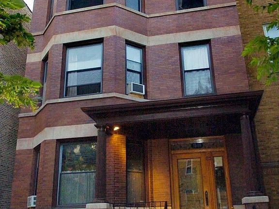 EXTERIOR OF 1911 VINTAGE BUILDING IN NORTH CENTER