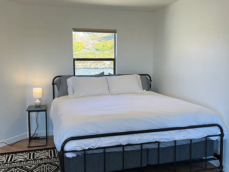 Bedroom #4 features a king bed and can be leveraged as an in-law suite / private living quarters