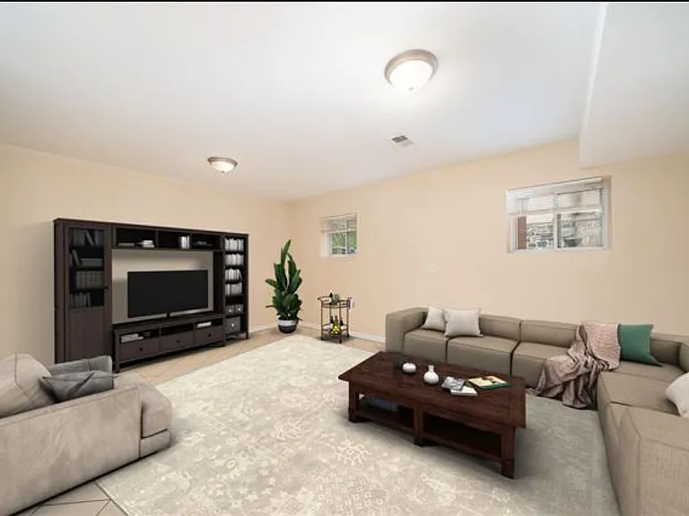 bonus room on garden level - almost like another apartment - includes a full bathroom