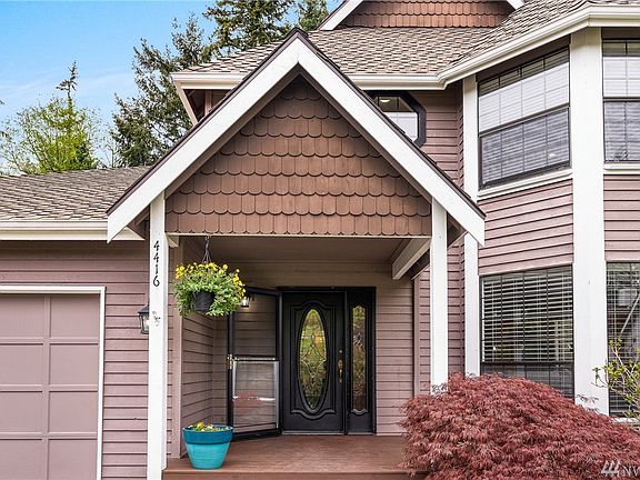 Inviting setting with covered front porch to greet your guests.