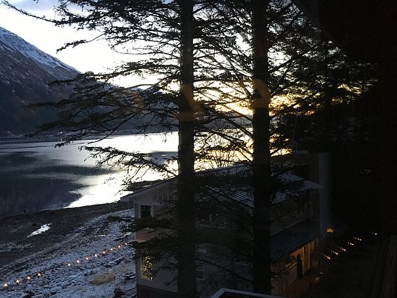 Looking down the channel from the sitting room on a winter morning .