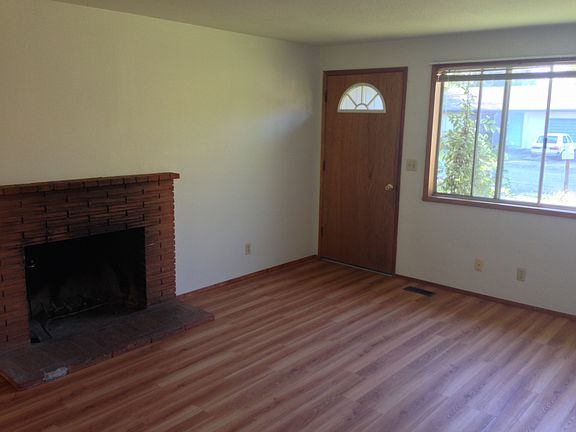 Front door and fireplace