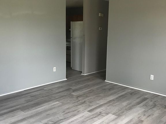 Second view of spacious living room.