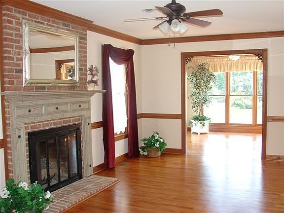 Main Living room to Sun Room with lake view