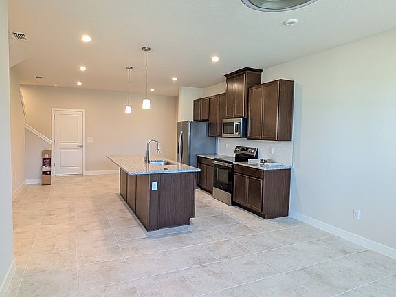 open floor kitchen, dining, living room