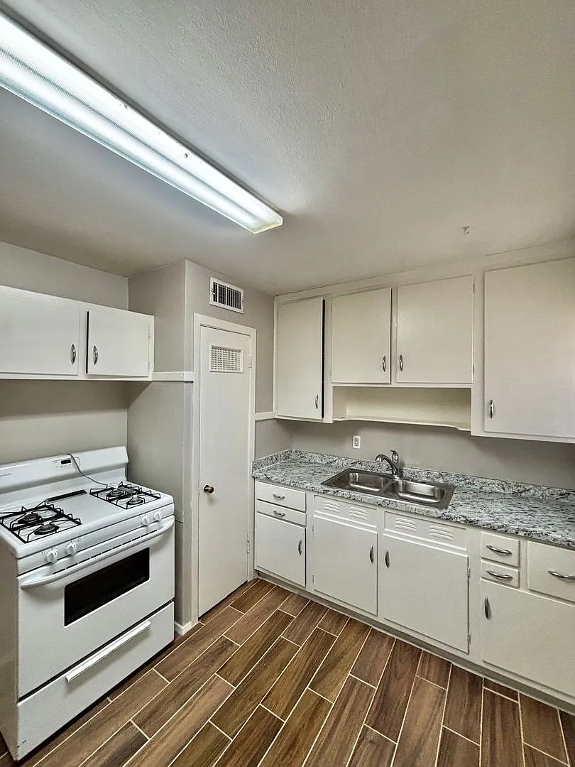 Village Apartments — Photo 4