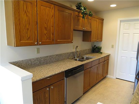 Kitchen with granite counters and lots of cabinets