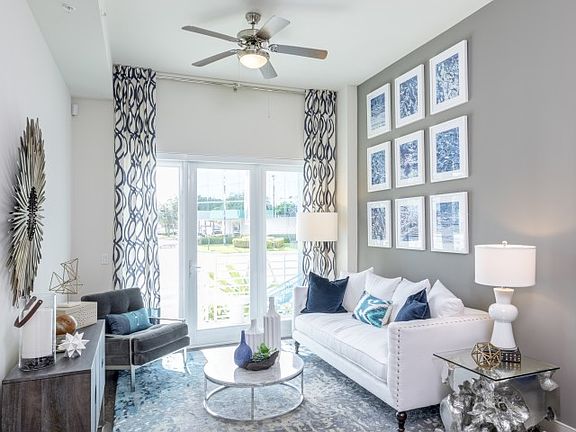 Oversized windows allow natural light perfect for reading