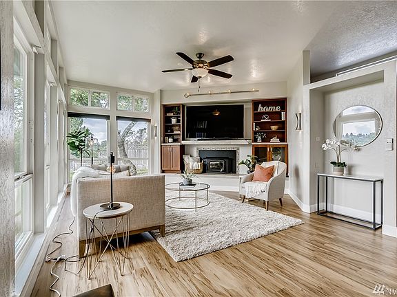 Living room with wood burning stove to bring that cozy feeling on winter nights!