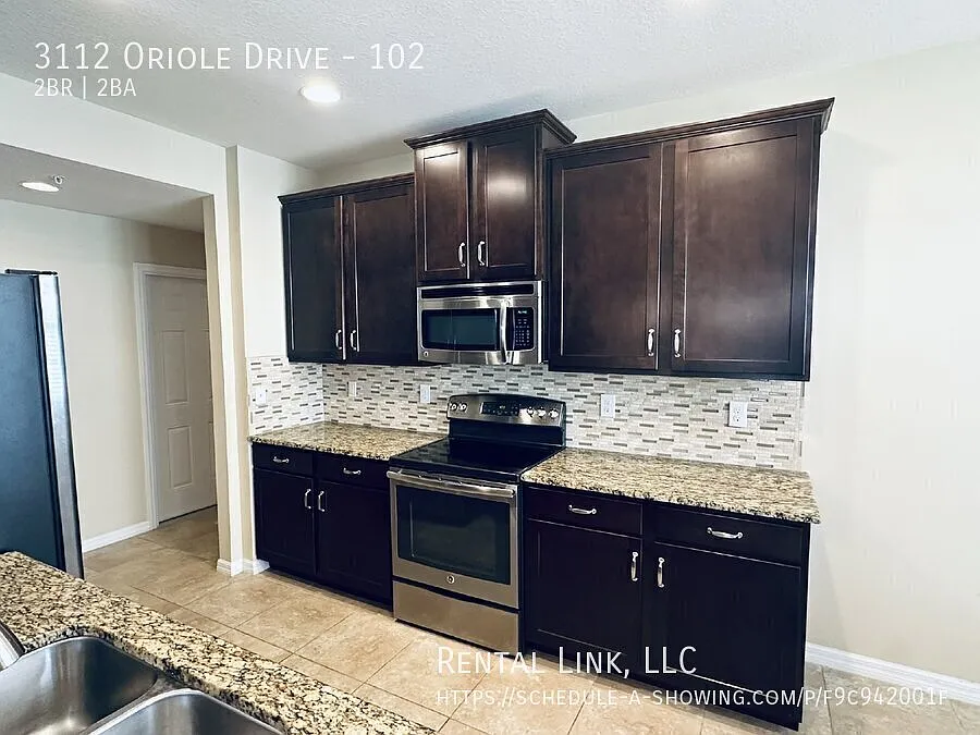 Building Photo - 3112 Oriole Dr #102